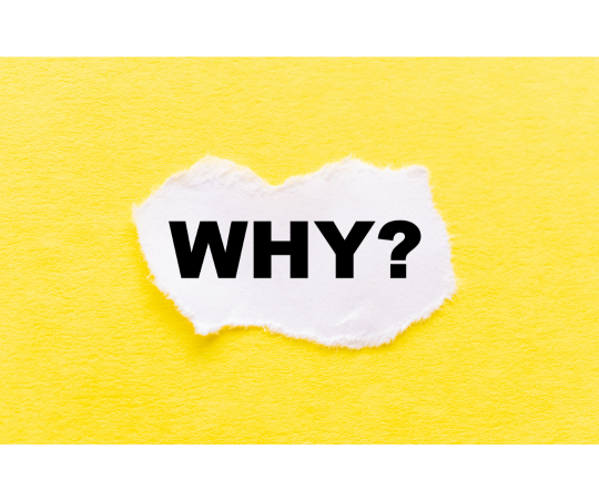 A graphic of a piece of ripped white paper on a yellow background, with the text "Why?" on the paper