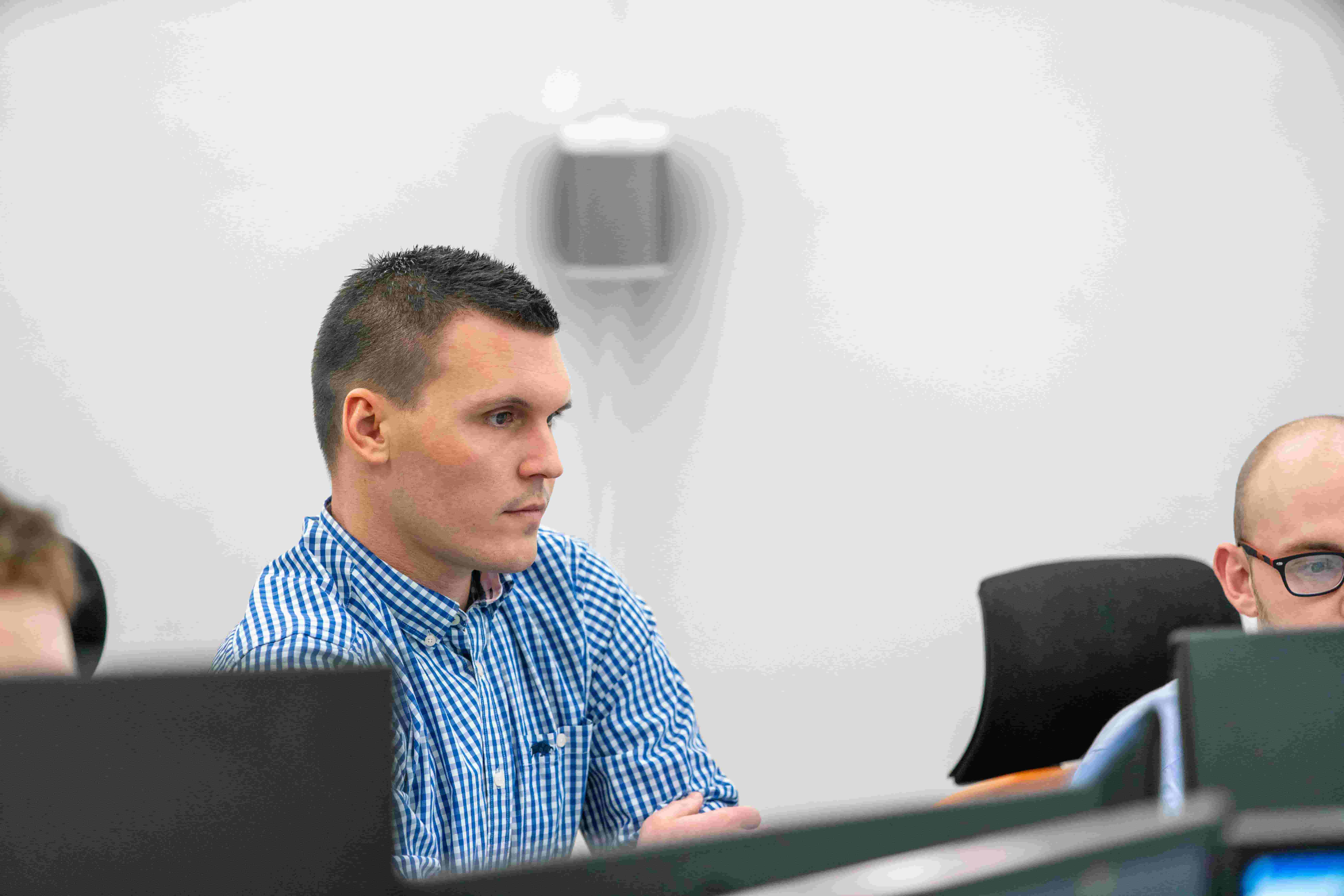 CEO Luke Fribbens at his desk in the Cold Banana Office