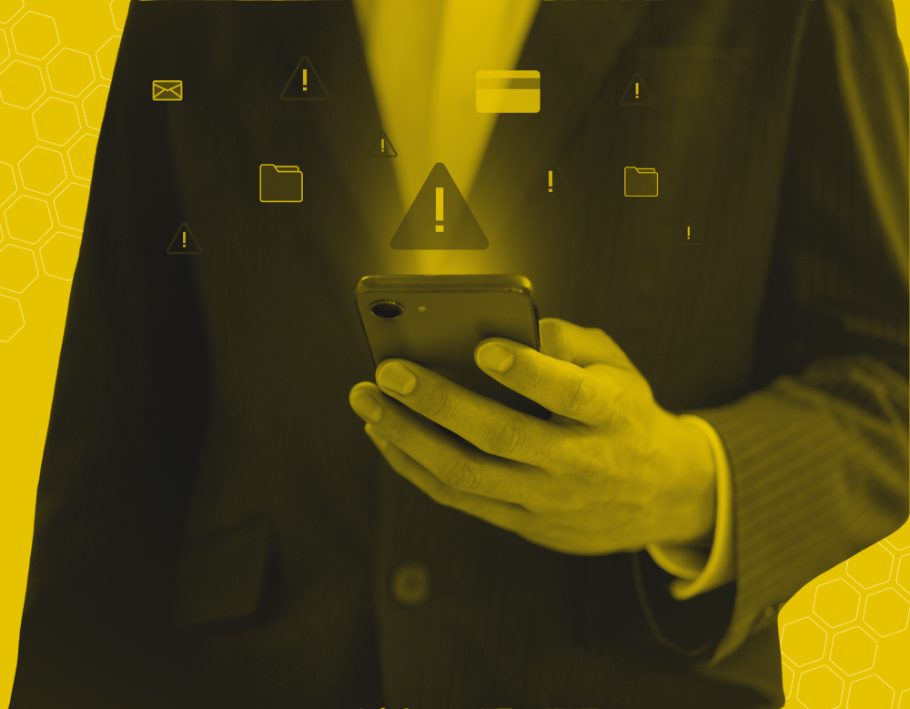 A black and yellow graphic of a person holding a smartphone with notifications and exclamation marks popping up out of it