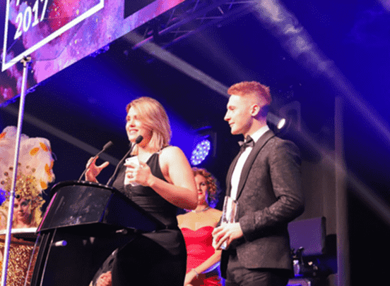 Ollie Storey on stage at 2017 business awards