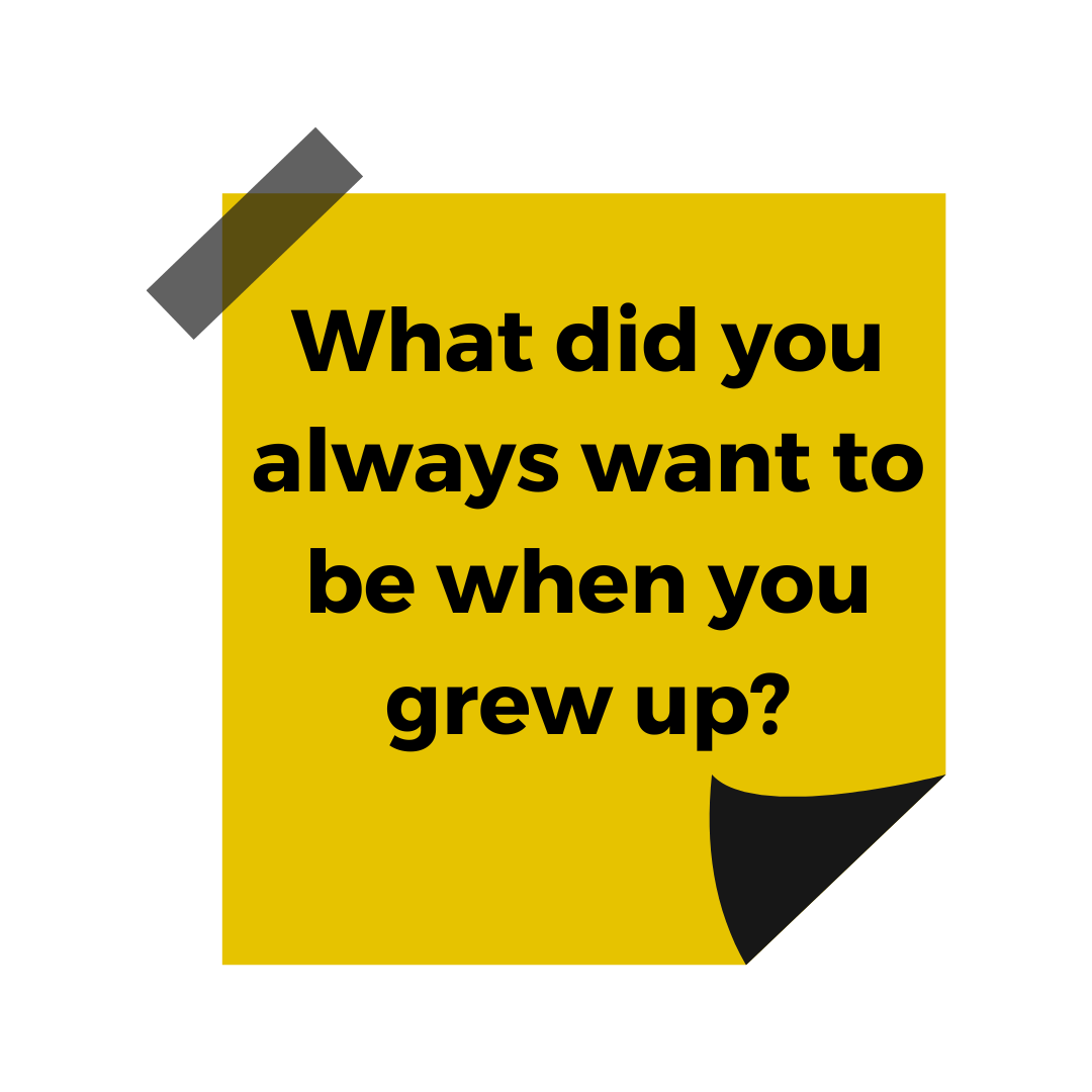 A yellow sticky note featuring the words 'What did you always want to be when you grew up?'