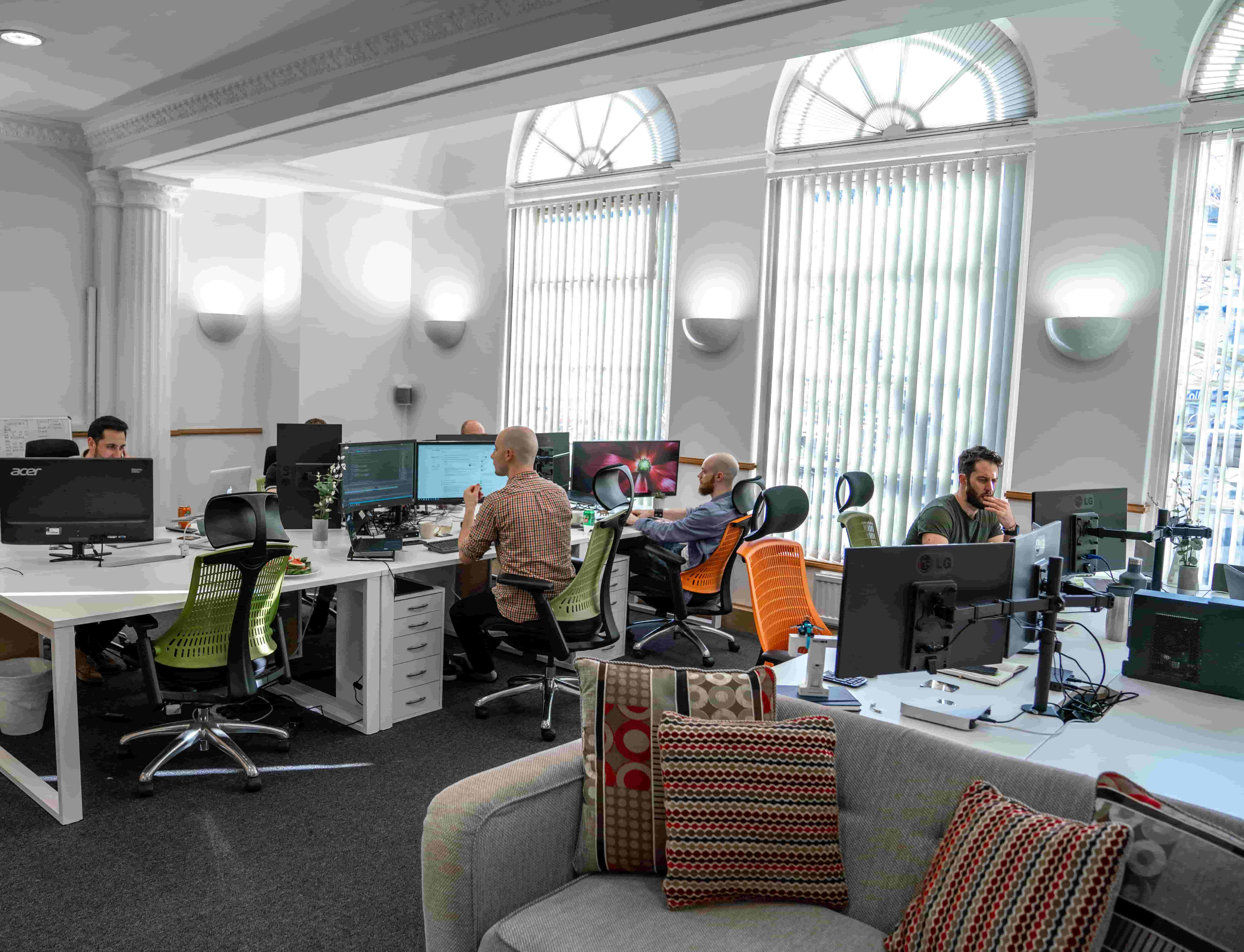 Staff working in the Cold Banana office.