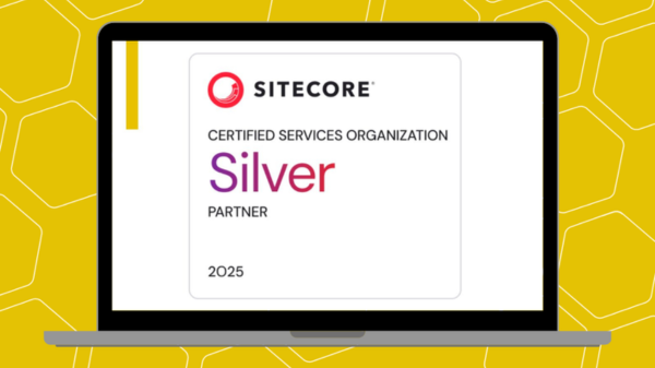 Sitecore Certified Services Organisation Silver Partner 2025 Certificate on a laptop