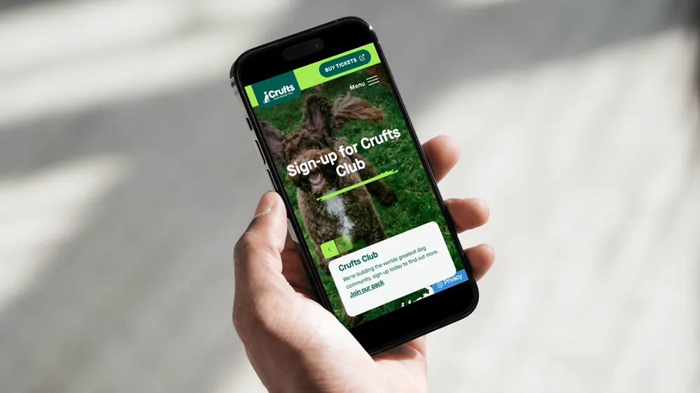 The "Crufts Club" webpage open on a smartphone device.