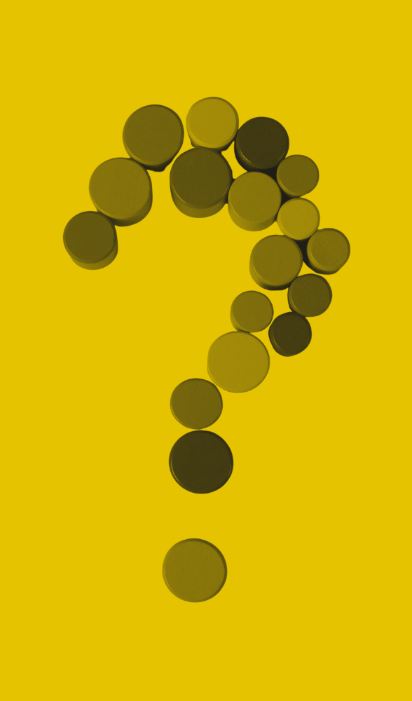 A black and yellow graphic of a question mark made of differently sized round blocks