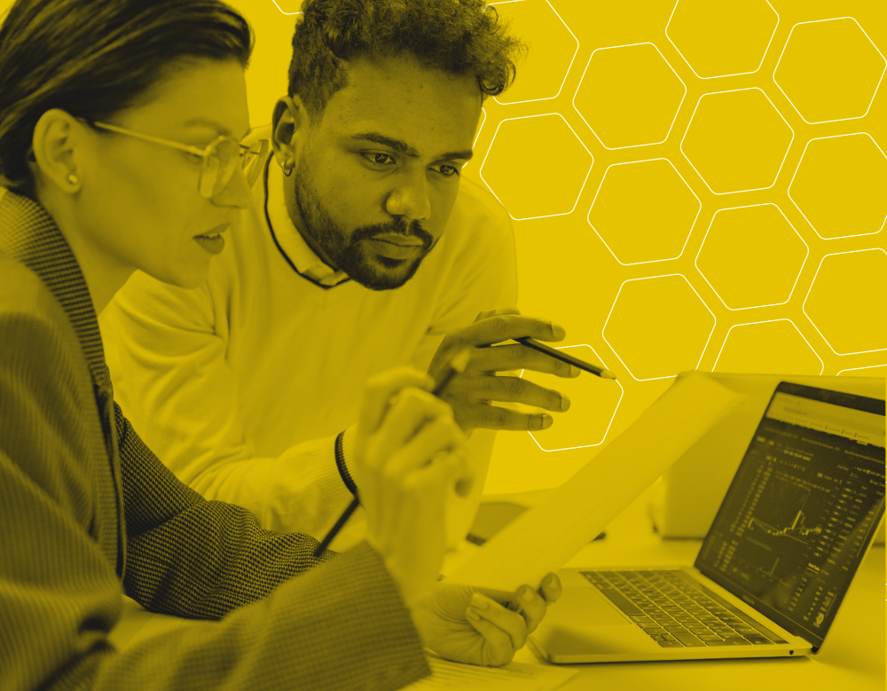 A black and yellow graphic of two people working together with analytics reporting software open on a laptop