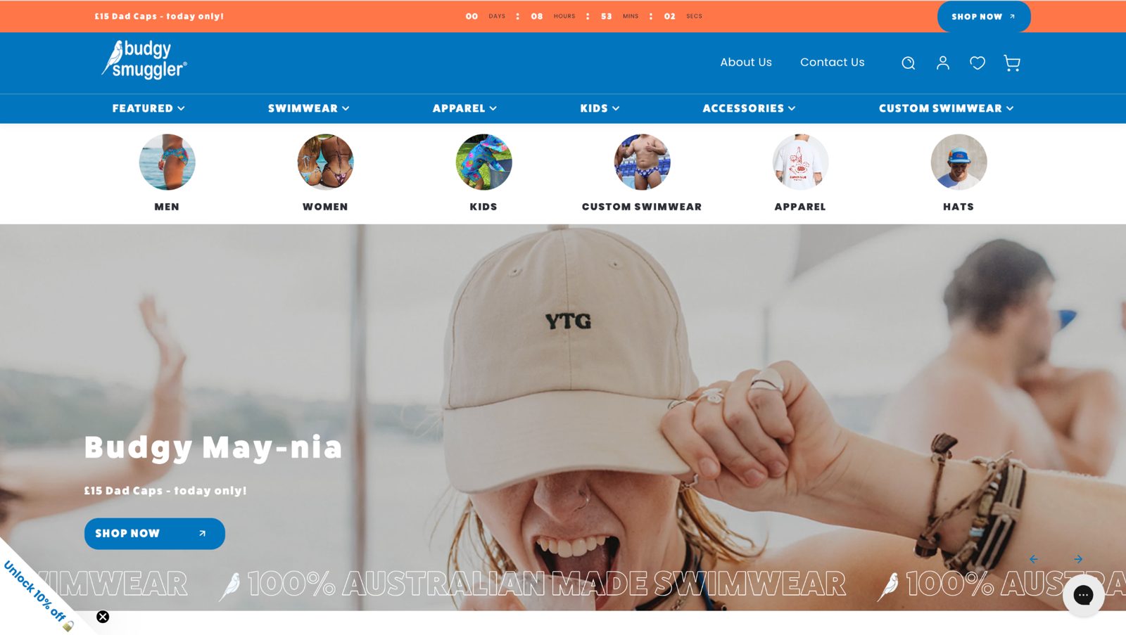 The Budgy Smuggler homepage, with shop categories and a campaign for dad caps