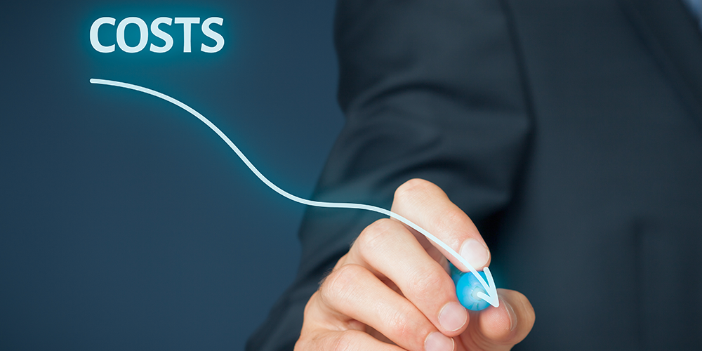 A person drawing a downward trending line in blue pen with the word "Costs" in the top left hand corner