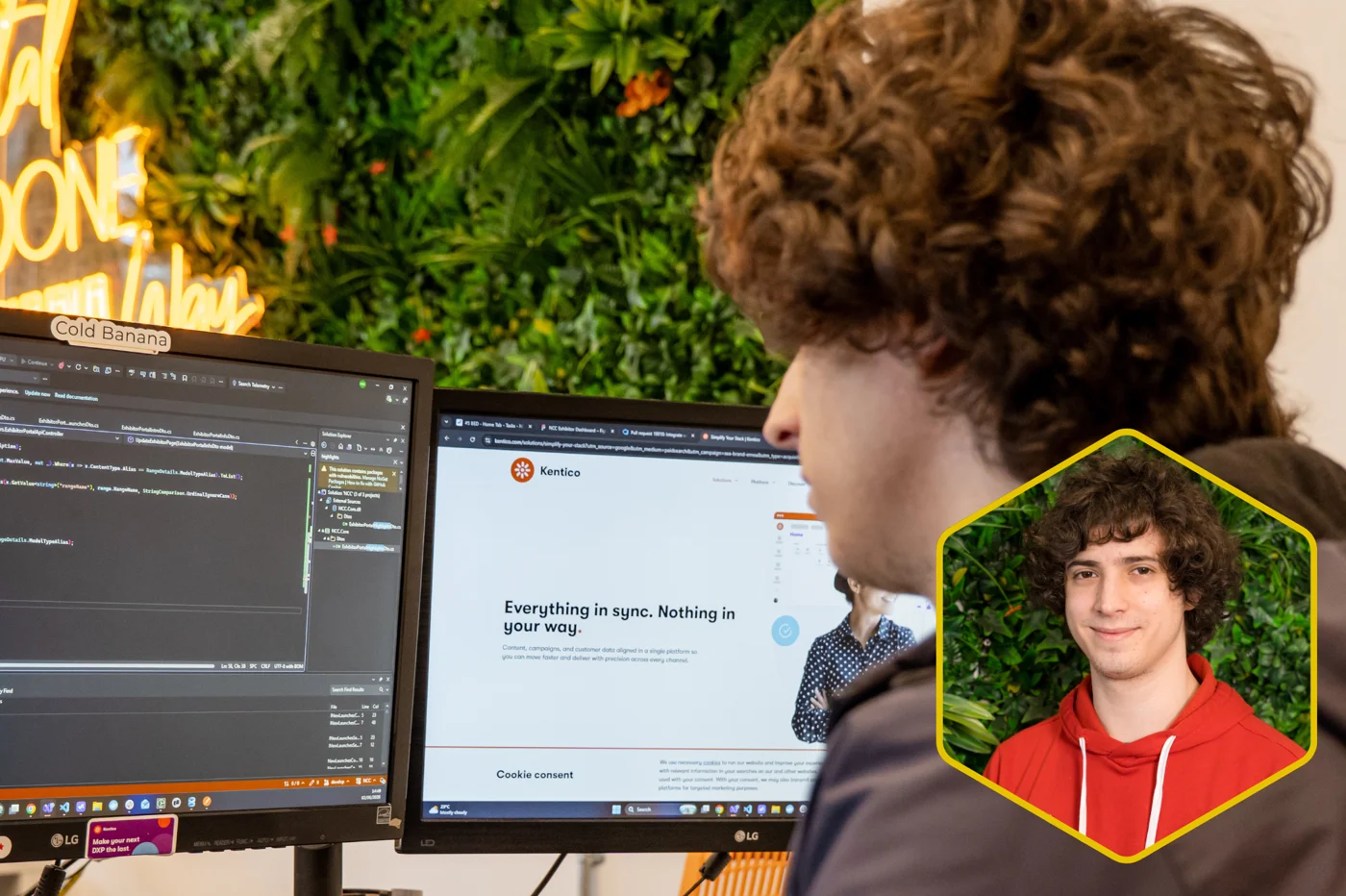 Hayden Moore working at Cold Banana, with his portrait alongside