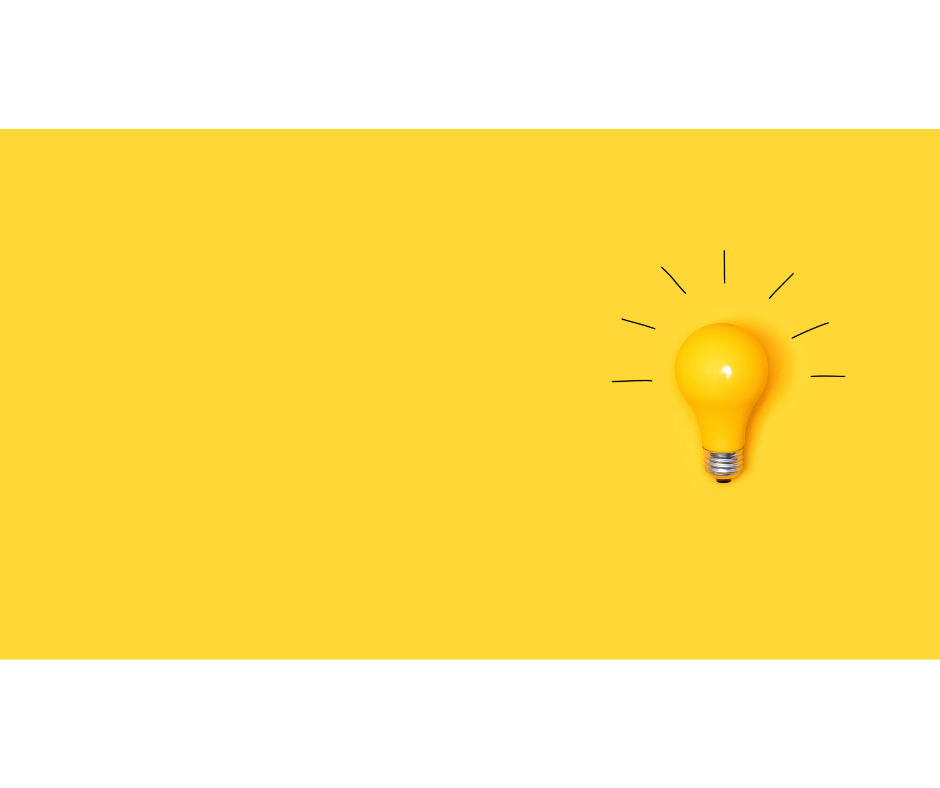 A yellow lightbulb with an illustration of light rays around it.