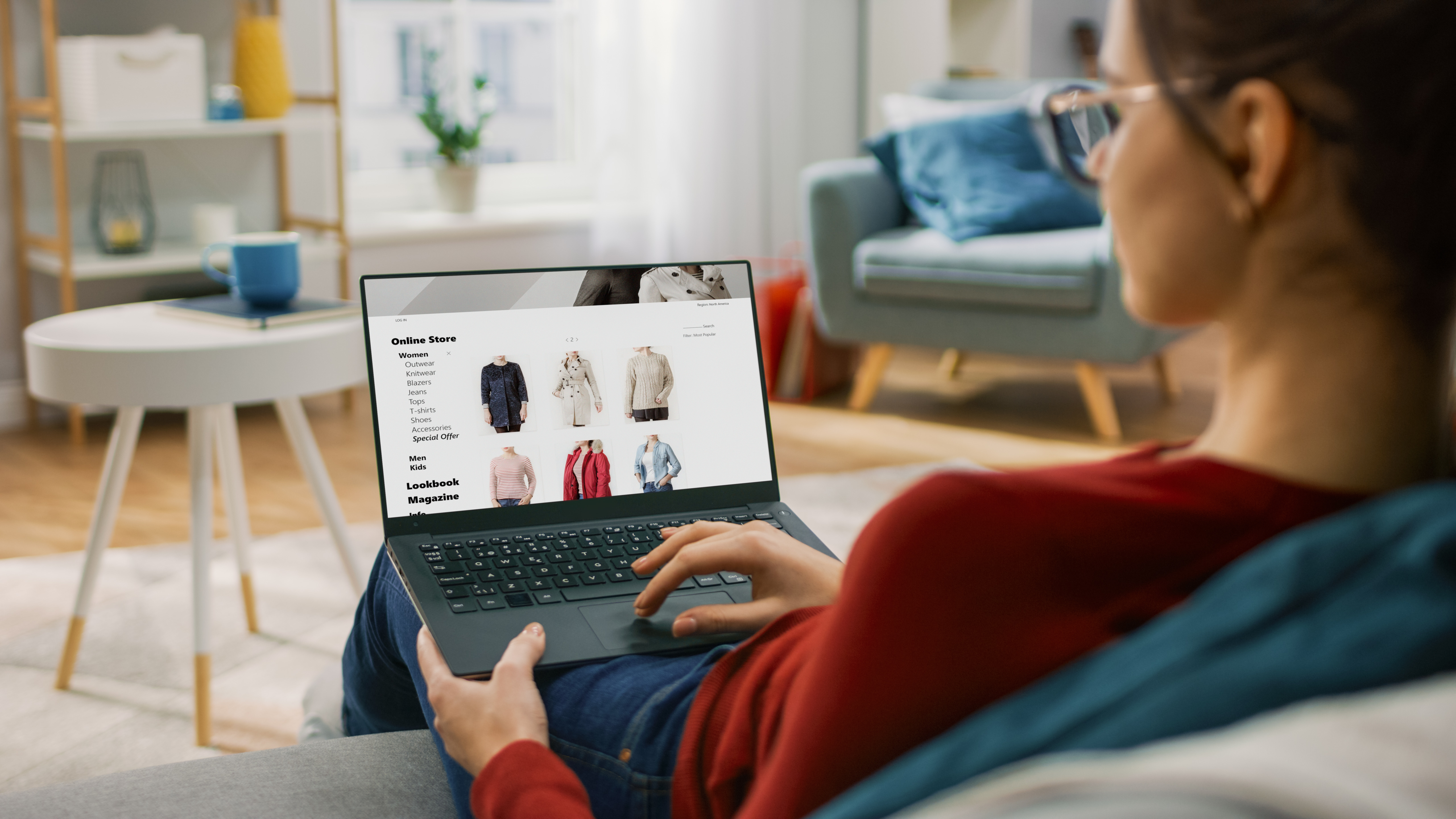 lady shopping on an ecommerce site on a laptop.